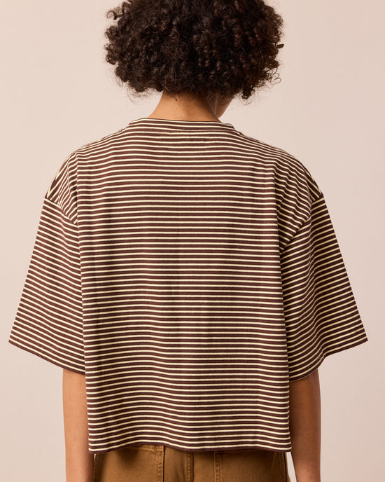 model wears nova brown and butter stripe jersey top