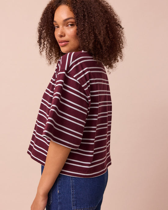 model wears nova burgundy and sky stripe jersey top