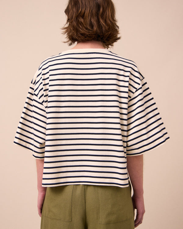 model wears nova ecru and ink jersey top