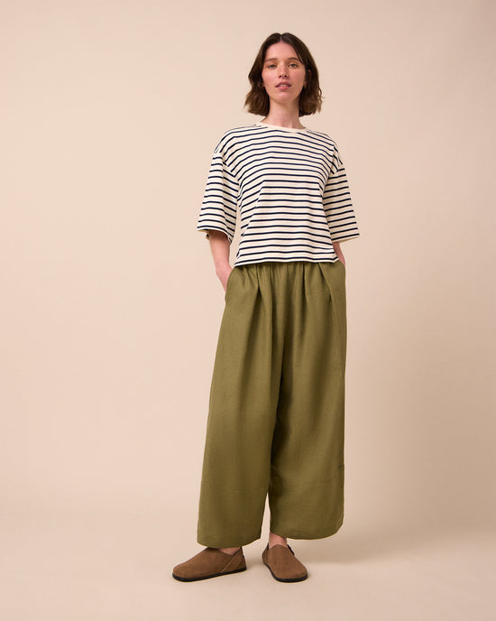 model wears nova ecru and ink jersey top