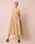 model wears olwen garden gingham cotton linen dress