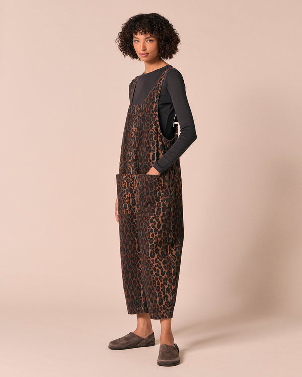 model wears ophelia dark leopard denim jumpsuit