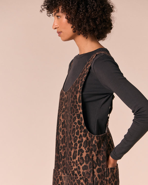 model wears ophelia dark leopard denim jumpsuit