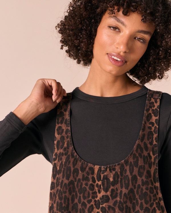 model wears ophelia dark leopard denim jumpsuit