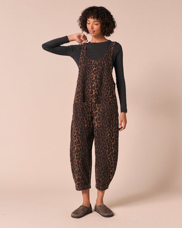 model wears ophelia dark leopard denim jumpsuit