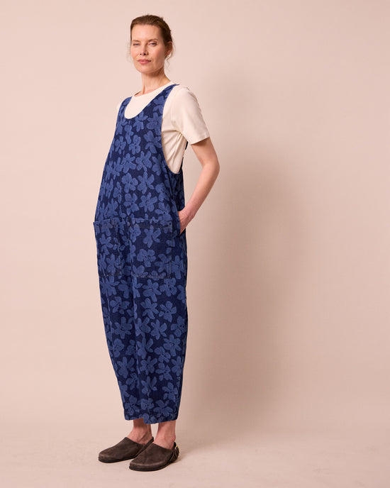 model wears ophelia pressed flower print denim jumpsuit