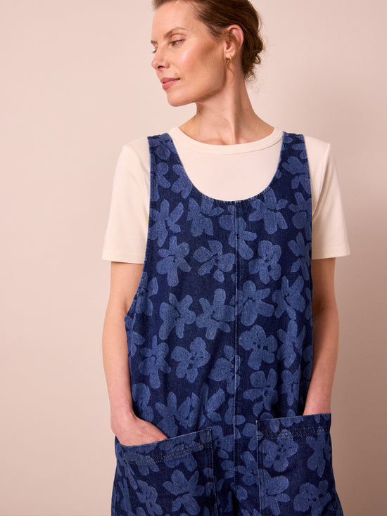 model wears ophelia pressed flower print denim jumpsuit