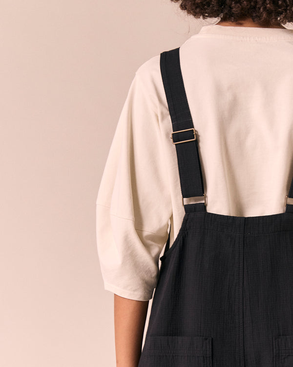 model wears ophelia black gauze jumpsuit