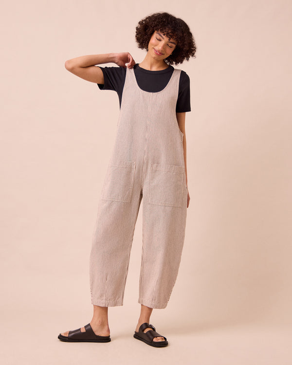 model wears the ophelia shell hickory stripe denim jumpsuit