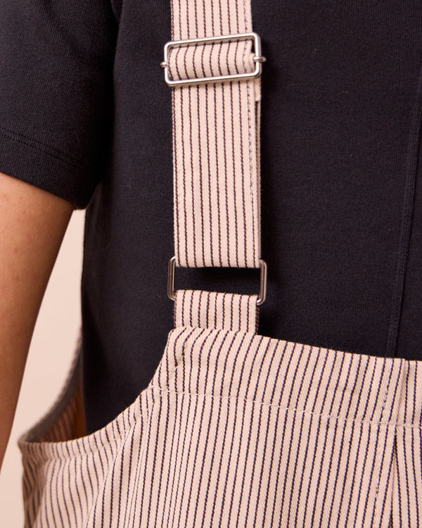 model wears the ophelia shell hickory stripe denim jumpsuit