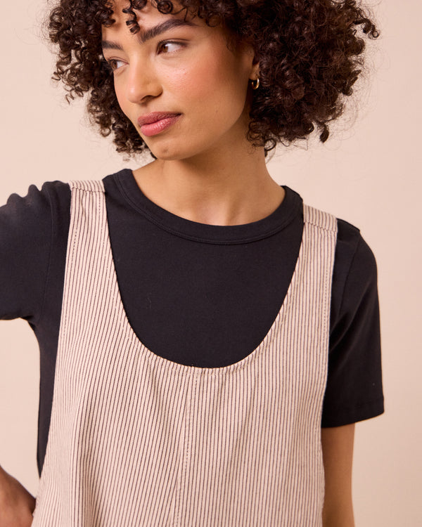 model wears the ophelia shell hickory stripe denim jumpsuit