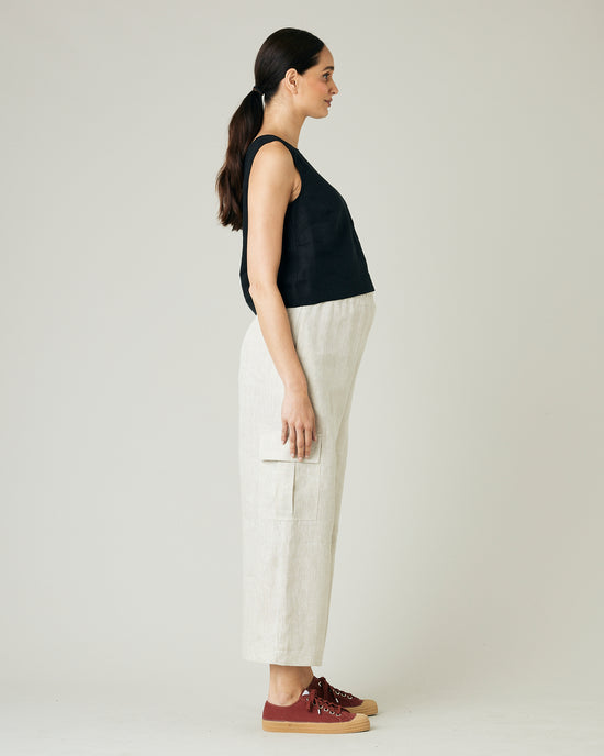 pregnant model wears natural linen orla trousers