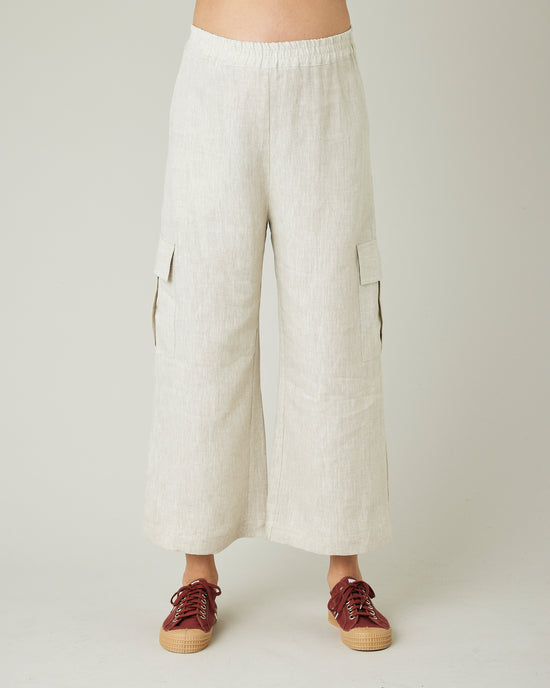 model wears natural linen orla trousers front