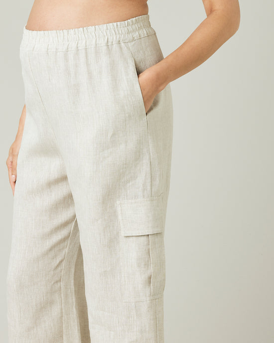 model wears natural linen orla trousers