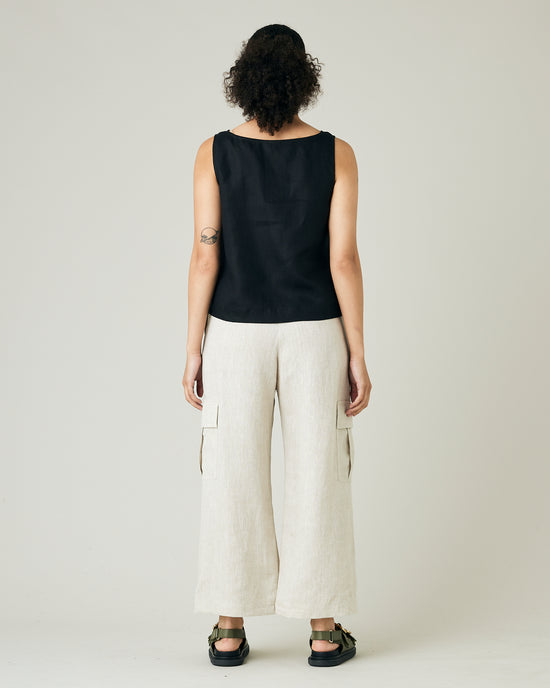 model wears natural linen orla trousers