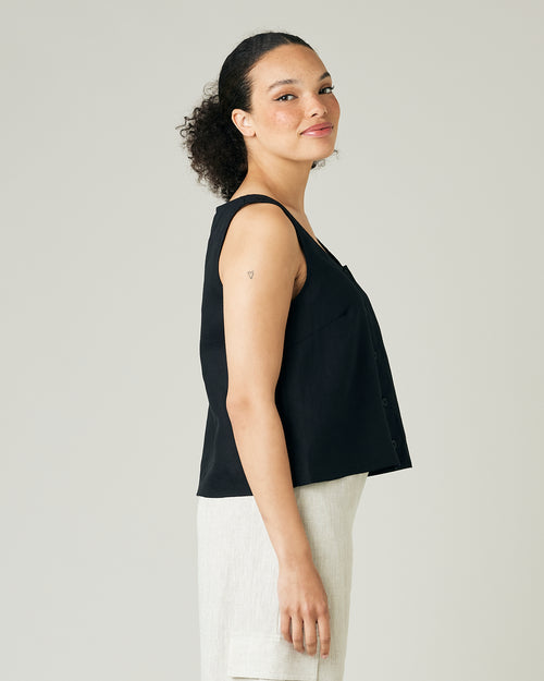 model wears black linen betty top