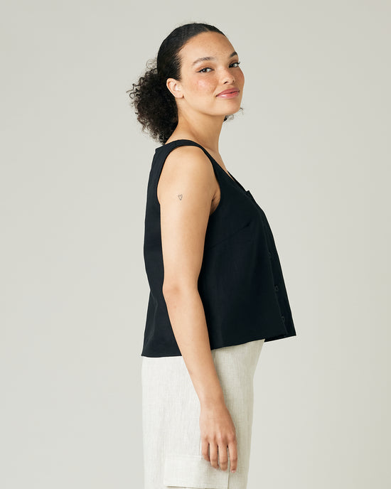 model wears black linen betty top