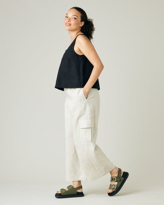 model wears natural linen orla trousers