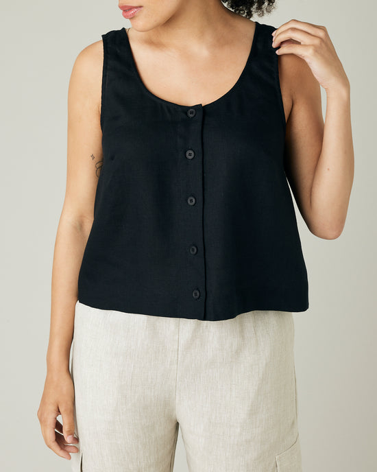 model wears black linen betty top