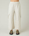 model wears natural linen orla trousers