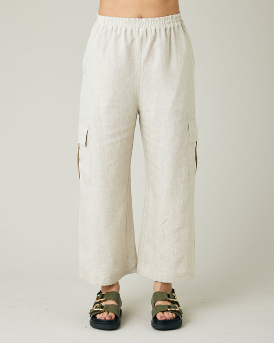 model wears natural linen orla trousers