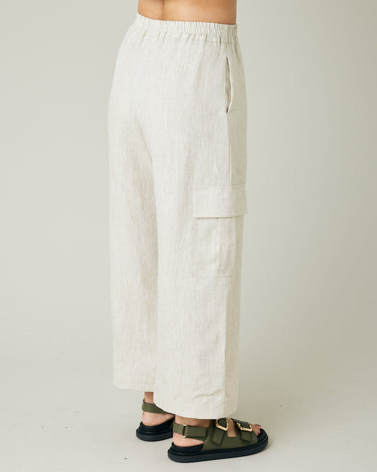 model wears natural linen orla trousers