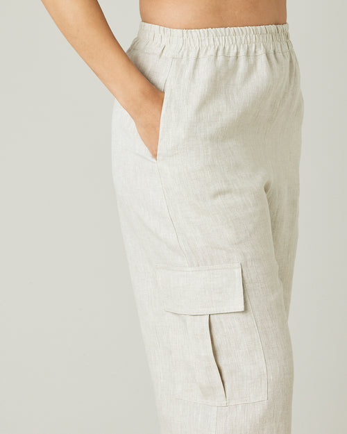 model wears natural linen orla trousers