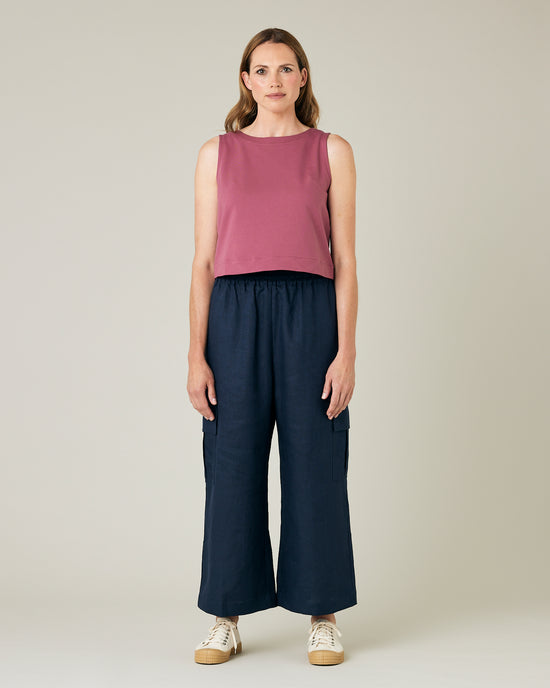 model wears navy linen orla trousers