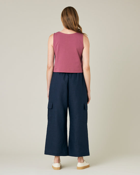 model wears navy linen orla trousers