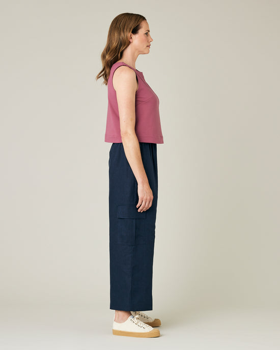 model wears navy linen orla trousers