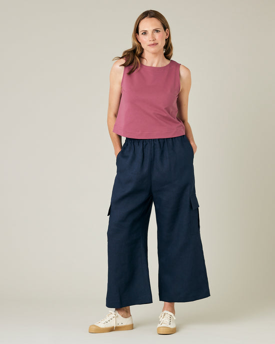 model wears navy linen orla trousers