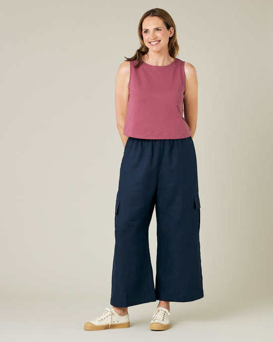 model wears navy linen orla trousers