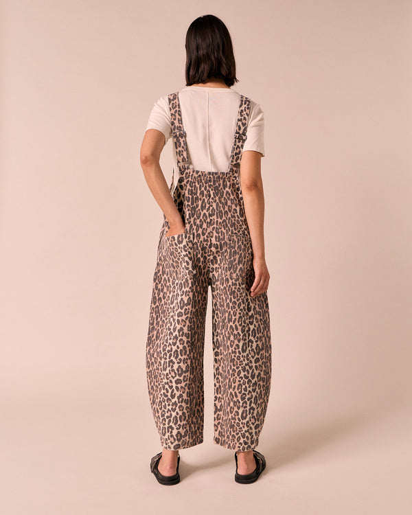 model wears ottie leopard print denim jumpsuit