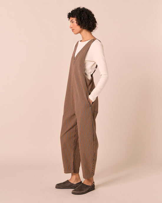 model wears ottie nutmeg pinstripe denim jumpsuit