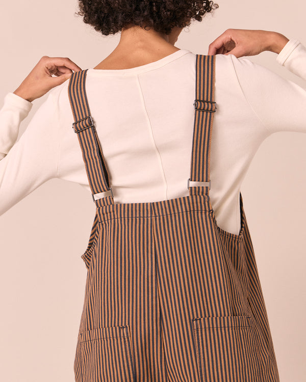 model wears ottie nutmeg pinstripe denim jumpsuit