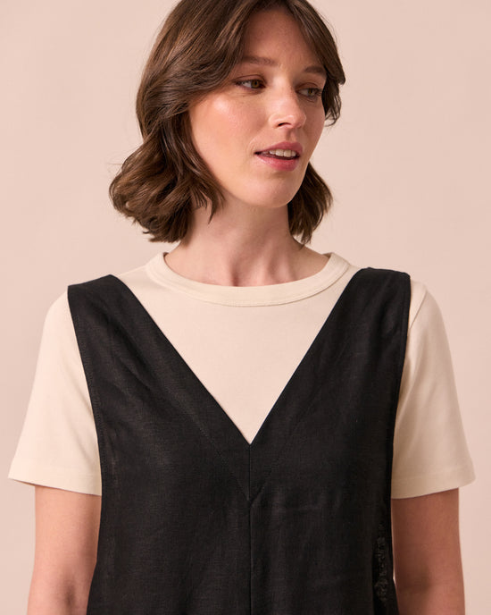 model wears ottie black linen jumpsuit