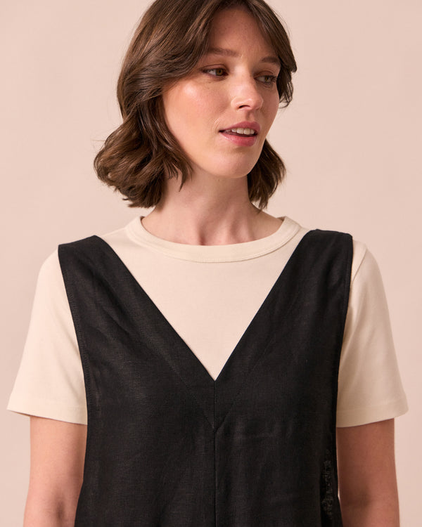 model wears ottie black linen jumpsuit