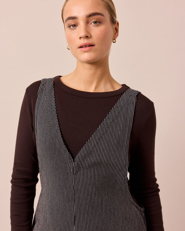 model wears ottie black hickory denim jumpsuit