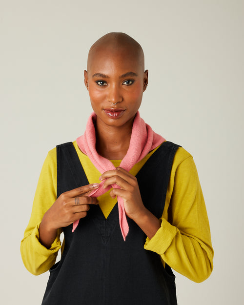 model wears dusty pink knitted neckerchief