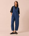 model wears ottie mid blue denim jumpsuit