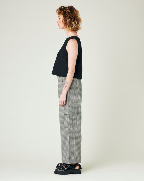 model wears black and stone micro gingham orla trousers