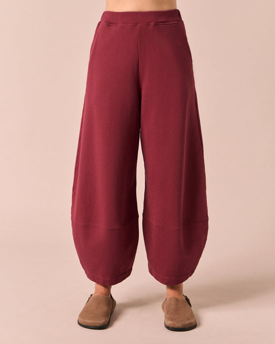 model wears pascale washed berry jersey trousers front