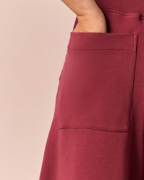 model wears pascale washed berry jersey trousers