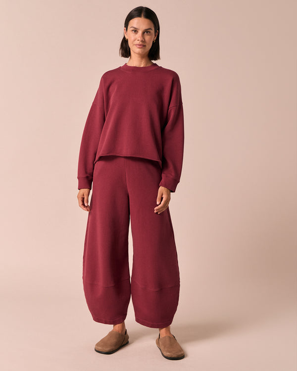model wears pascale washed berry jersey trousers right