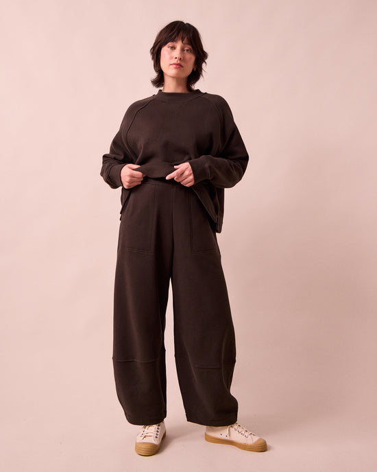 model wears pascale ganache fleeceback jersey trousers left