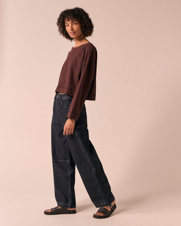 model wears echo washed black denim jeans right