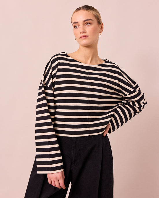 model wears peggy black and white stripe jersey top