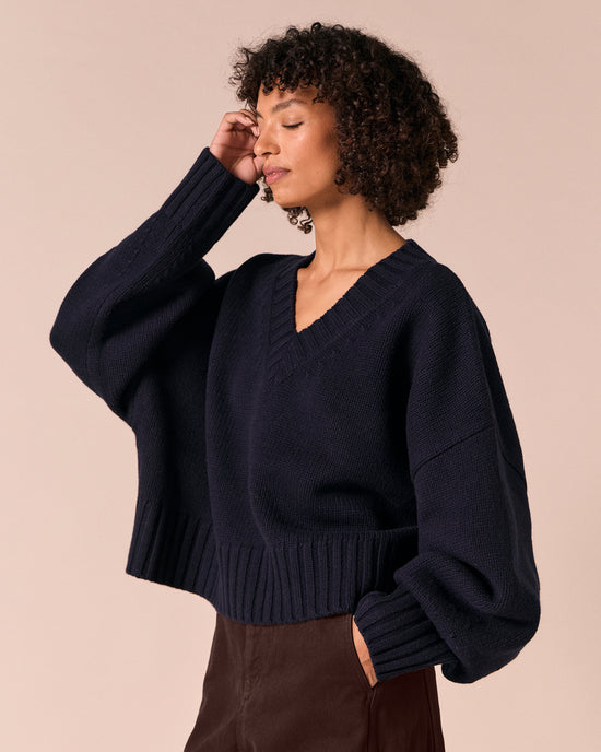 model wears phoebe navy knitted jumper