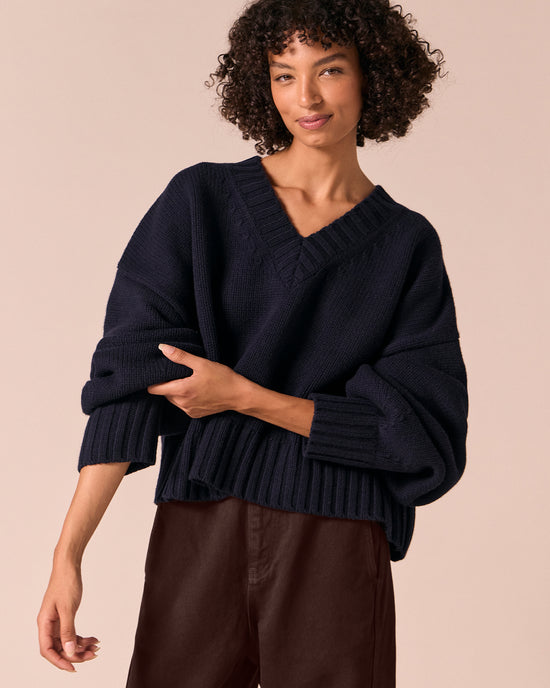 model wears phoebe navy knitted jumper