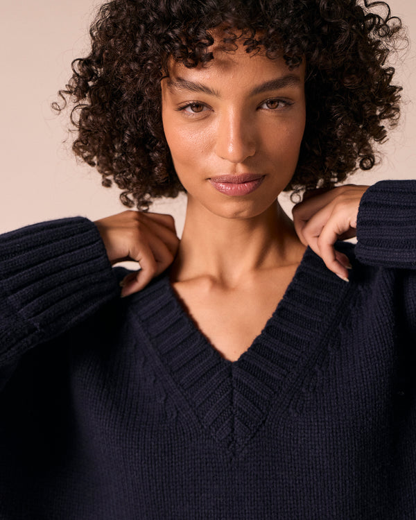 model wears phoebe navy knitted jumper